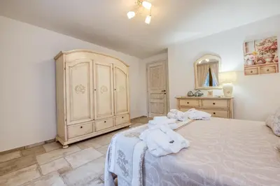 Letto o letti in una camera di Villa Barastula, confort e relax