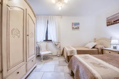 Letto o letti in una camera di Villa Barastula, confort e relax