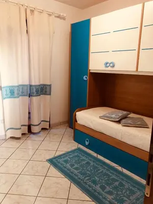 Letto o letti in una camera di Casa Valentina