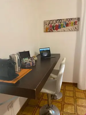 TV o dispositivi per l'intrattenimento presso A casa da Mari stanza privata Bagno condiviso