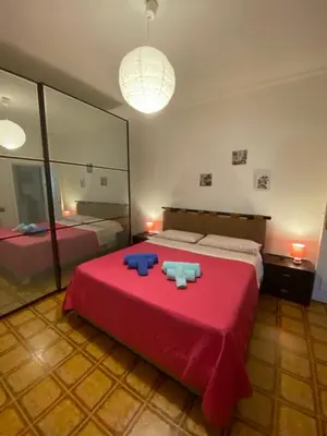 Letto o letti in una camera di A casa da Mari stanza privata Bagno condiviso
