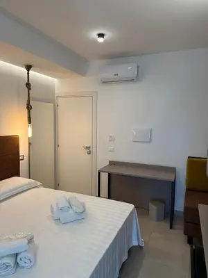 Letto o letti in una camera di Amani Chic Rooms