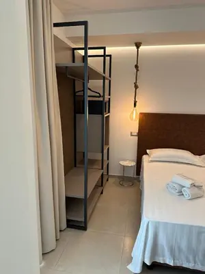 Letto o letti in una camera di Amani Chic Rooms
