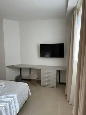 TV o dispositivi per l'intrattenimento presso Amani Chic Rooms
