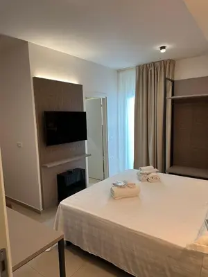 Letto o letti in una camera di Amani Chic Rooms