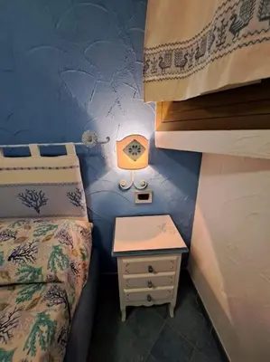 Letto o letti in una camera di Casa Ichnusa - 1 bedroom seaview apartment