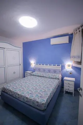 Letto o letti in una camera di Casa Ichnusa - 1 bedroom seaview apartment