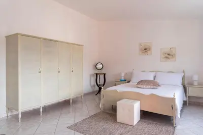 Letto o letti in una camera di Casa Duesse