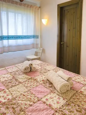 Letto o letti in una camera di CASA BENNY