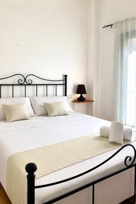 Letto o letti in una camera di Square Inn Apartment