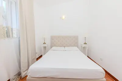 Letto o letti in una camera di Casa delle brezze - A due passi dalla riva