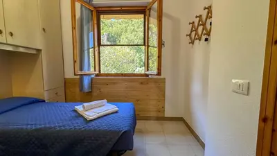 Letto o letti in una camera di Casa Bentu 'E Mare con vista
