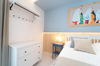 Letto o letti in una camera di Velis - art & hospitality