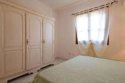 Letto o letti in una camera di Appartamento Rododendro con A/C