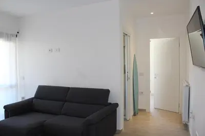 TV o dispositivi per l'intrattenimento presso Olbia Apartment