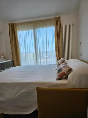 Letto o letti in una camera di MiniMaison