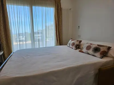 Letto o letti in una camera di MiniMaison