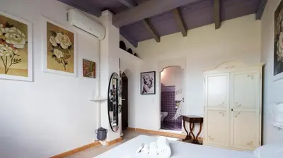 Letto o letti in una camera di Armonia
