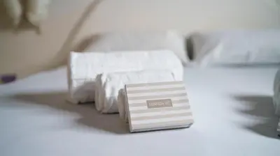 Letto o letti in una camera di Armonia