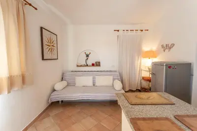 Letto o letti in una camera di Sa Domo e Aurelia