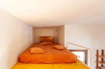 Letto o letti in una camera di Sa Domo e Aurelia