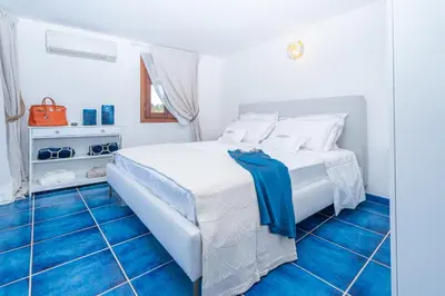 Letto o letti in una camera di Villa Graya