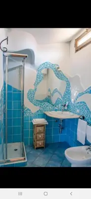 Bagno di Le Andira - Monolocali finemente arredati a pochi passi dal centro storico di Orosei