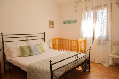 Letto o letti in una camera di Villa Angedras