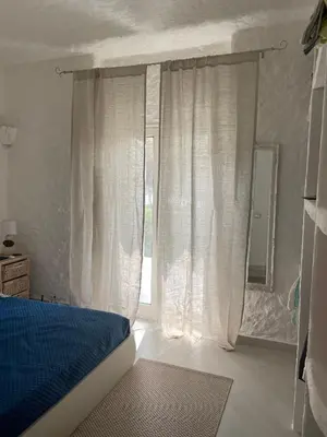 Letto o letti in una camera di Villa Marghe