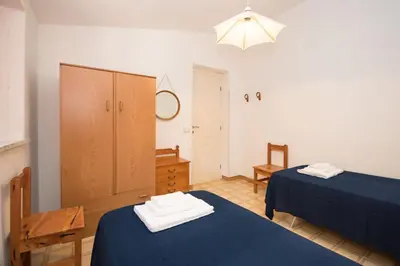Letto o letti in una camera di Casa Cala Liberotto a 100 metri dalla spiaggia