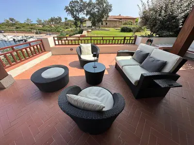 Balcone o terrazza di Pearl Home - Sea View and 10 min from La Cinta and Lu Impostu Beach