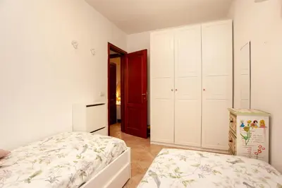 Letto o letti in una camera di Villa Coclea con piscina