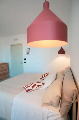 Letto o letti in una camera di Casa Amerì affittacamere