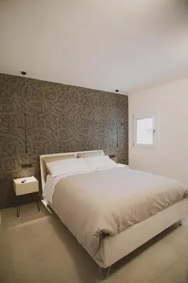 Letto o letti in una camera di Casa Amerì affittacamere