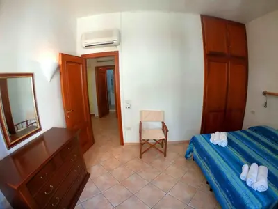 Letto o letti in una camera di Villa Emilia appartments
