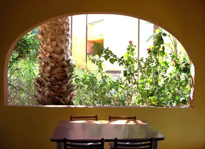 Giardino di NEST HOUSE - ESCLUSIVO APPARTAMENTO Marina di Olbia- MATER OLBIA - Beaches - close to the Airport - PRIVATE PARKING- Full comforts -