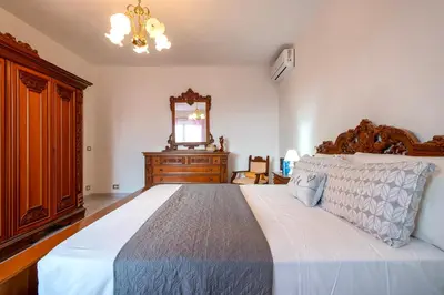 Letto o letti in una camera di Domus Cilla