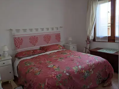 Letto o letti in una camera di Villetta Stella Marina