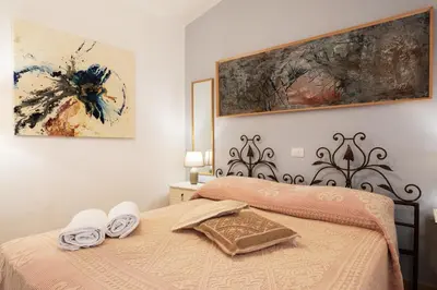 Letto o letti in una camera di affittacamere IL CASTELLO posada