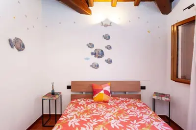Letto o letti in una camera di Villetta Monica