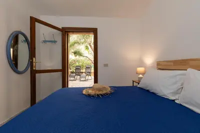 Letto o letti in una camera di Casa Girgolu by Wonderful Italy