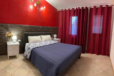 Letto o letti in una camera di Casa Levante