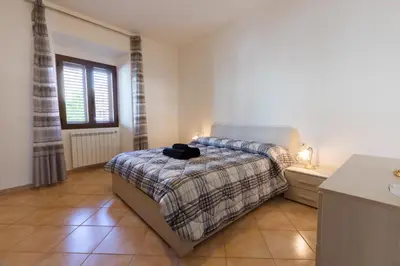 Letto o letti in una camera di AD Apartment
