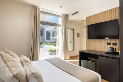 TV o dispositivi per l'intrattenimento presso RH Lifestyle Rooms & Suites
