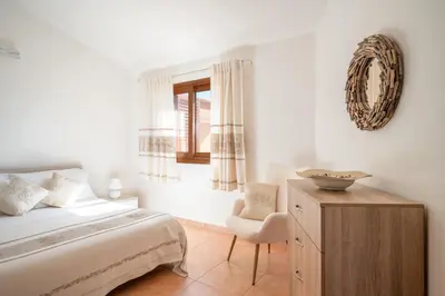 Letto o letti in una camera di Appartamento OASIS con vista mare