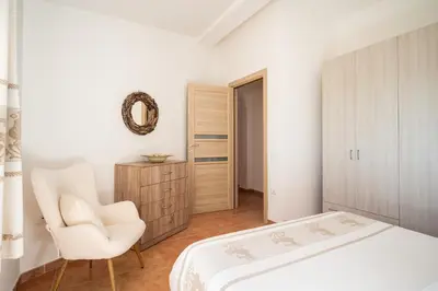 Letto o letti in una camera di Appartamento OASIS con vista mare