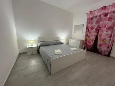 Letto o letti in una camera di Case Raggio di Sole