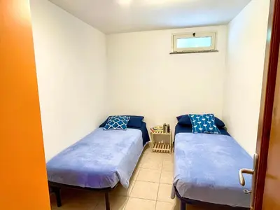 Letto o letti in una camera di Appartamento Blue IUN T1261