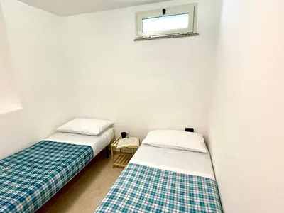 Letto o letti in una camera di Appartamento Blue IUN T1261