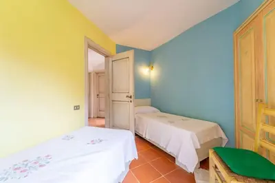 Letto o letti in una camera di Villa Zagara